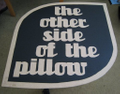 the other side of the pillow Logo